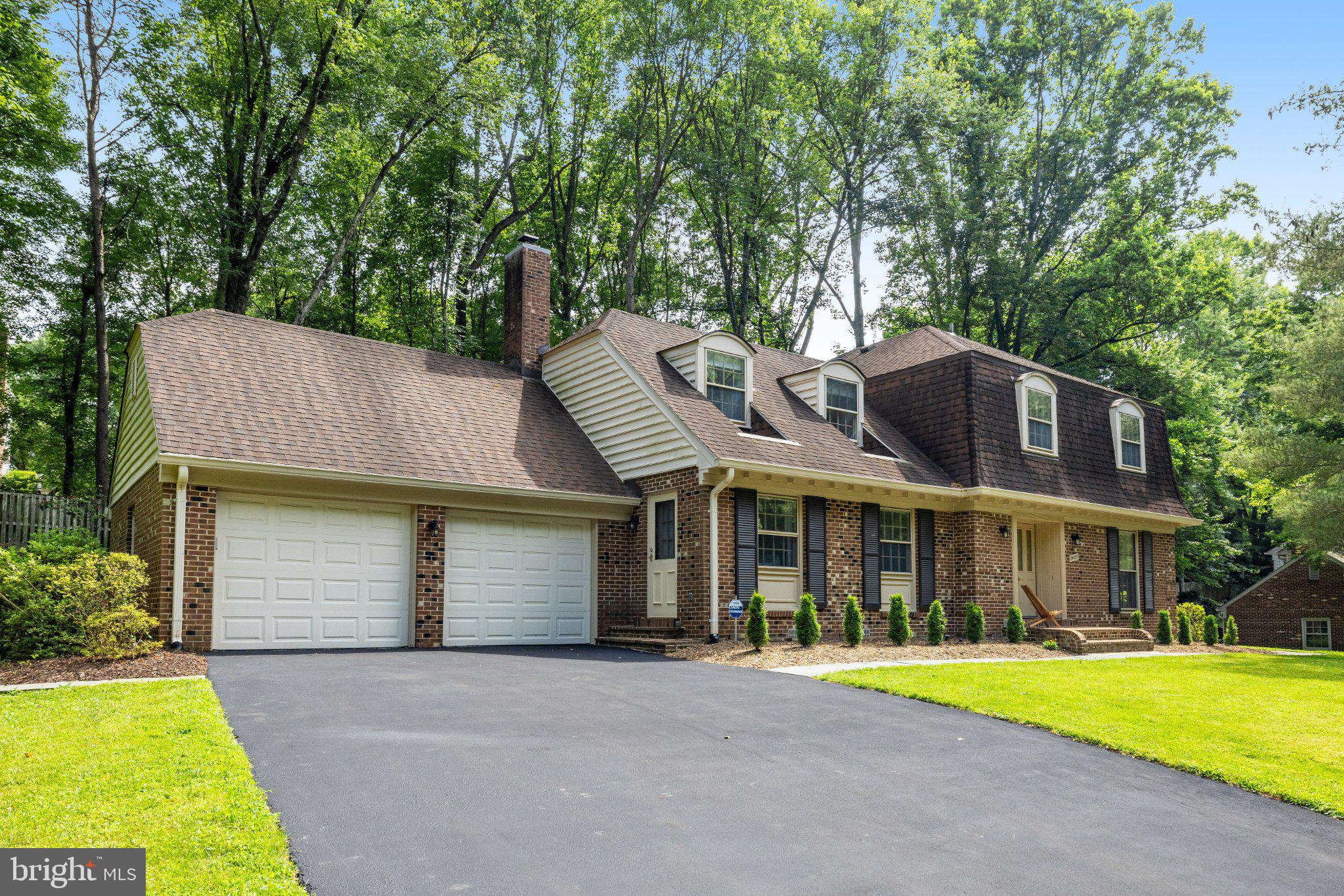 1427 Laurel Hill Road Vienna, VA 22182 - Photo 3 of 57 Charming home nestled in lush greenery.
