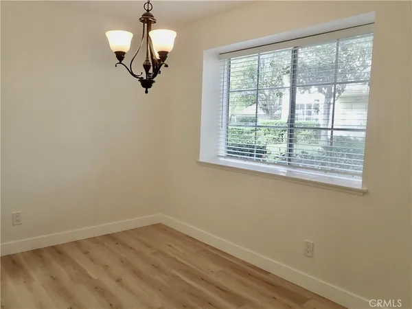 a view of a room with a large window