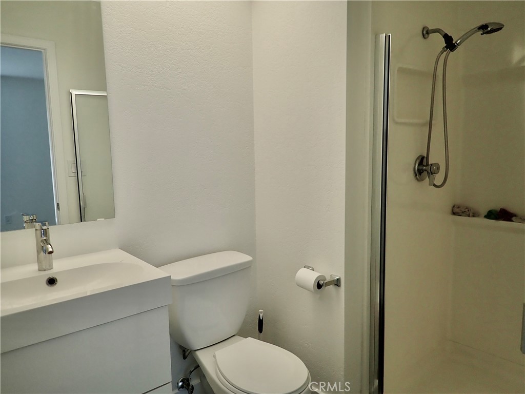 4201 Las Virgenes Road, Unit 108 Calabasas, CA 91302 - Photo 8 of 15 a bathroom with a sink a toilet and shower