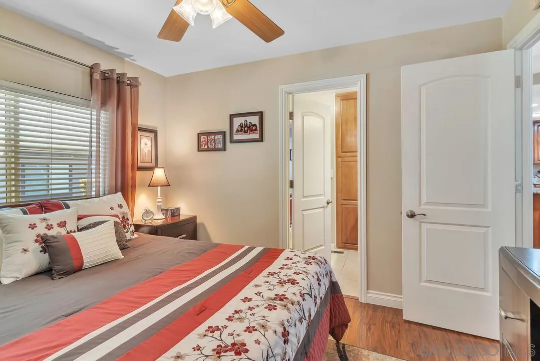 18218 Paradise Mountain Road, Unit 203 Valley Center, CA 92082 - Photo 33 of 68 a bedroom with bed and a window