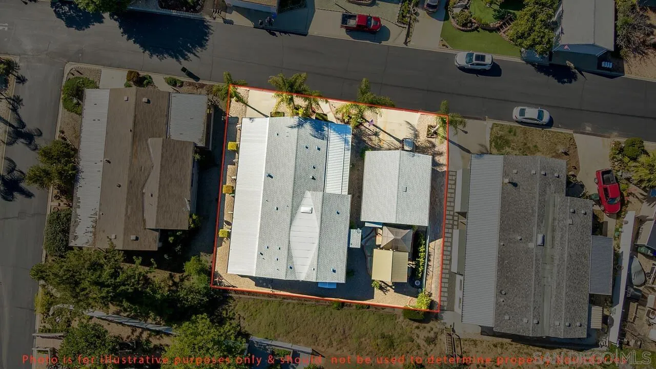 18218 Paradise Mountain Road, Unit 203 Valley Center, CA 92082 - Photo 49 of 68 a view of a house with a door and a small yard
