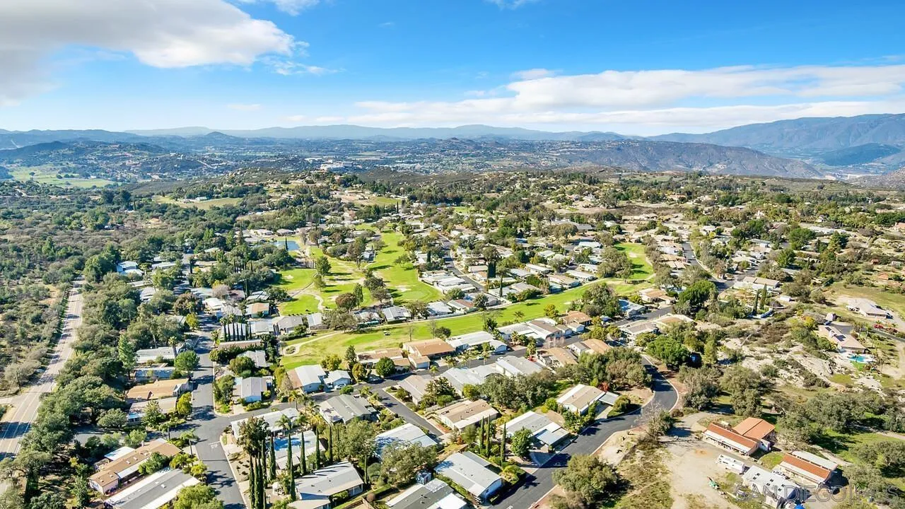 18218 Paradise Mountain Road, Unit 203 Valley Center, CA 92082 - Photo 54 of 68 an aerial view of residential houses with outdoor space