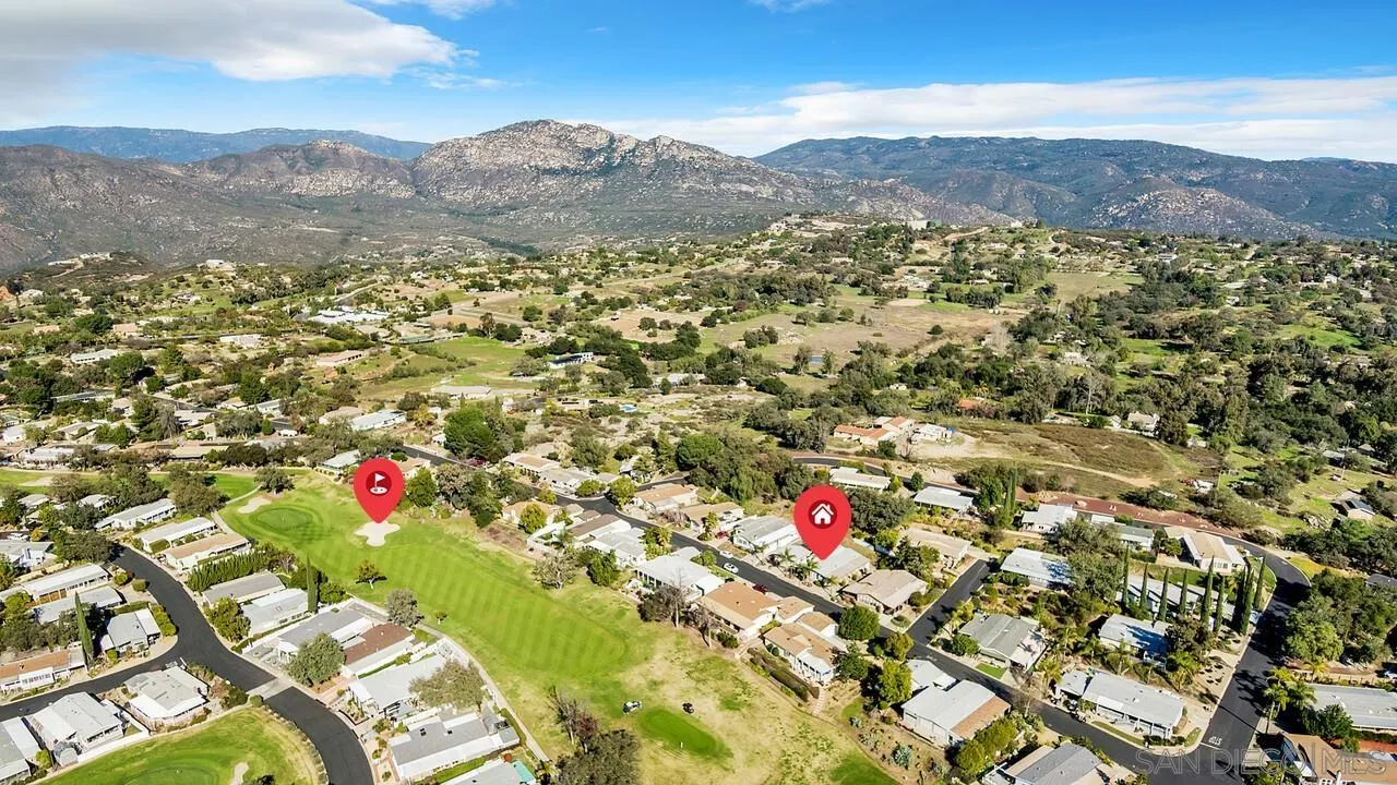 18218 Paradise Mountain Road, Unit 203 Valley Center, CA 92082 - Photo 57 of 68 a view of a city with a mountain