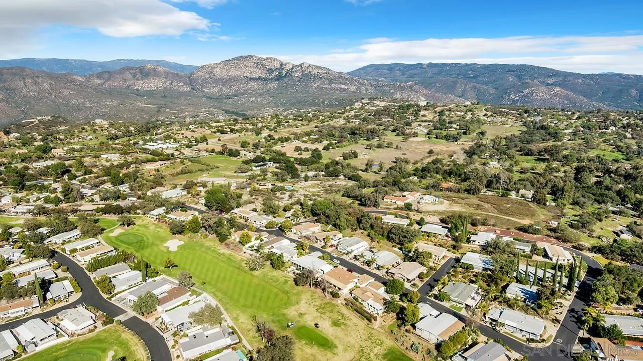 18218 Paradise Mountain Road, Unit 203 Valley Center, CA 92082 - Photo 58 of 68 a view of a city with mountains in the background