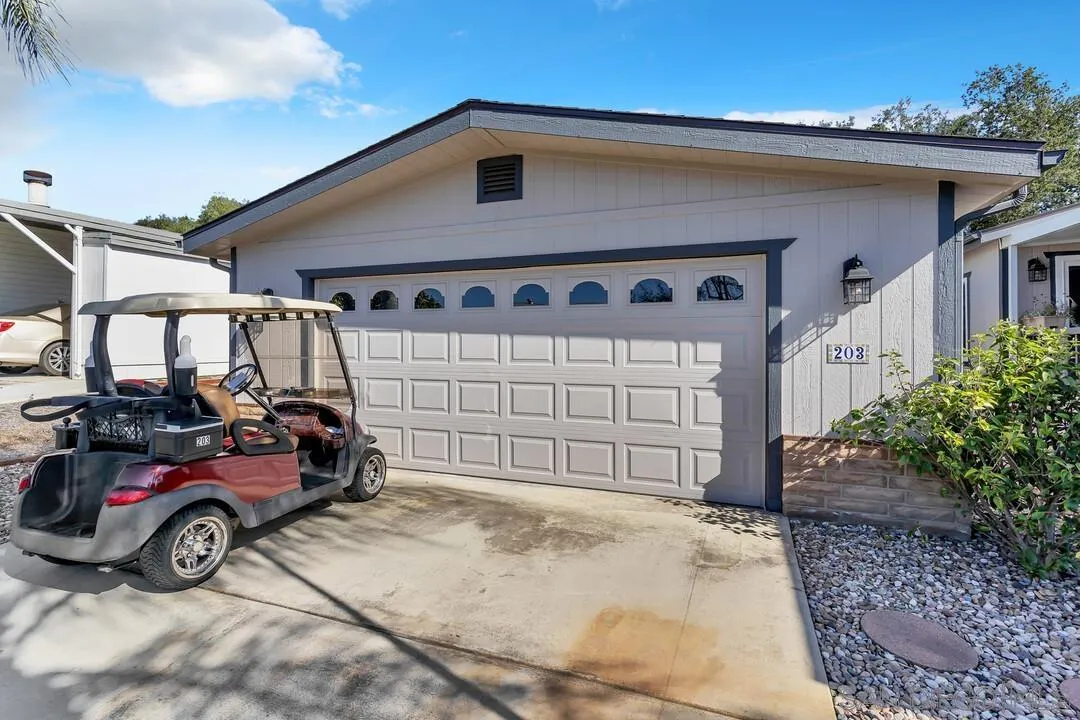 18218 Paradise Mountain Road, Unit 203 Valley Center, CA 92082 - Photo 6 of 68 a view of a car garage