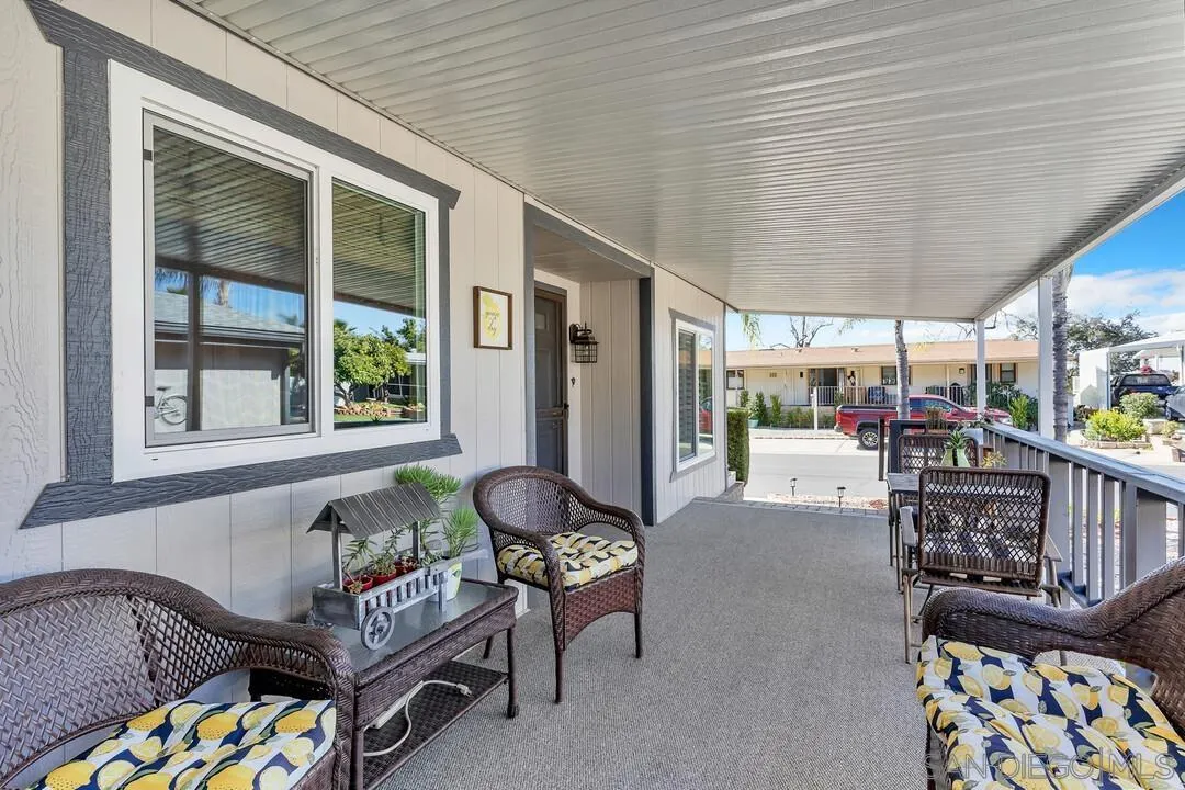 18218 Paradise Mountain Road, Unit 203 Valley Center, CA 92082 - Photo 9 of 68 a outdoor living space with furniture