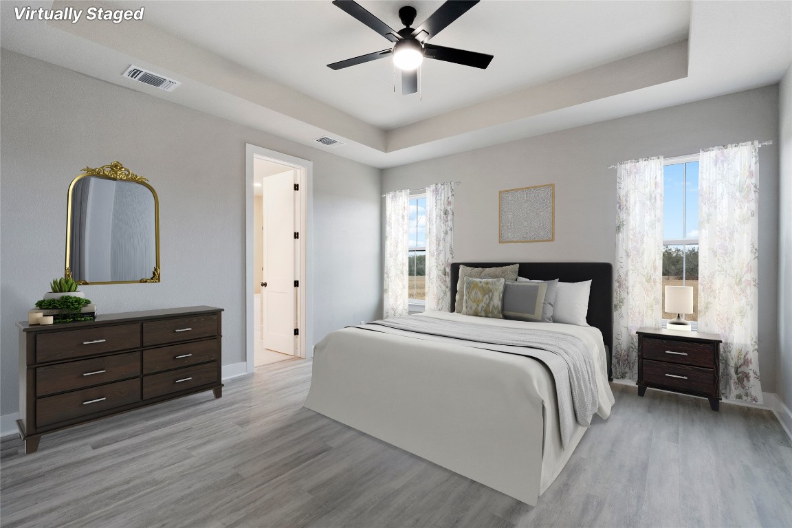 16544 Fm 112 Thrall, TX 76578 - Photo 13 of 28 a bedroom with a bed and a dresser