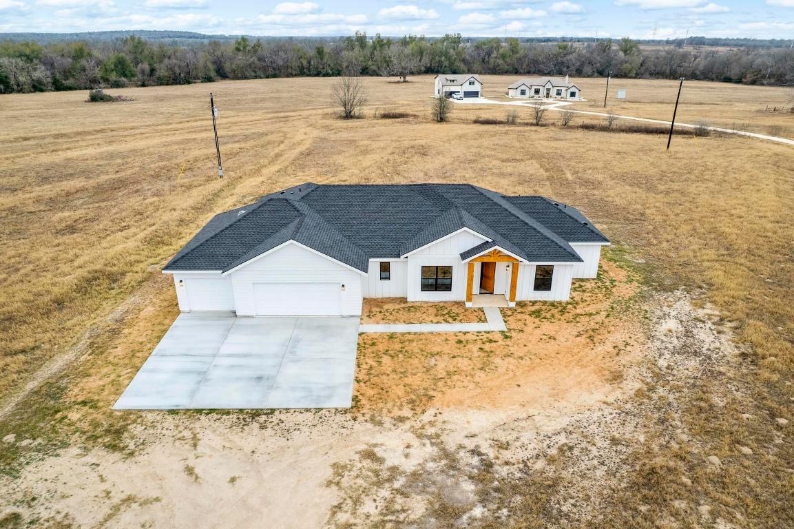 16544 Fm 112 Thrall, TX 76578 - Photo 27 of 28 a front view of a house with a yard