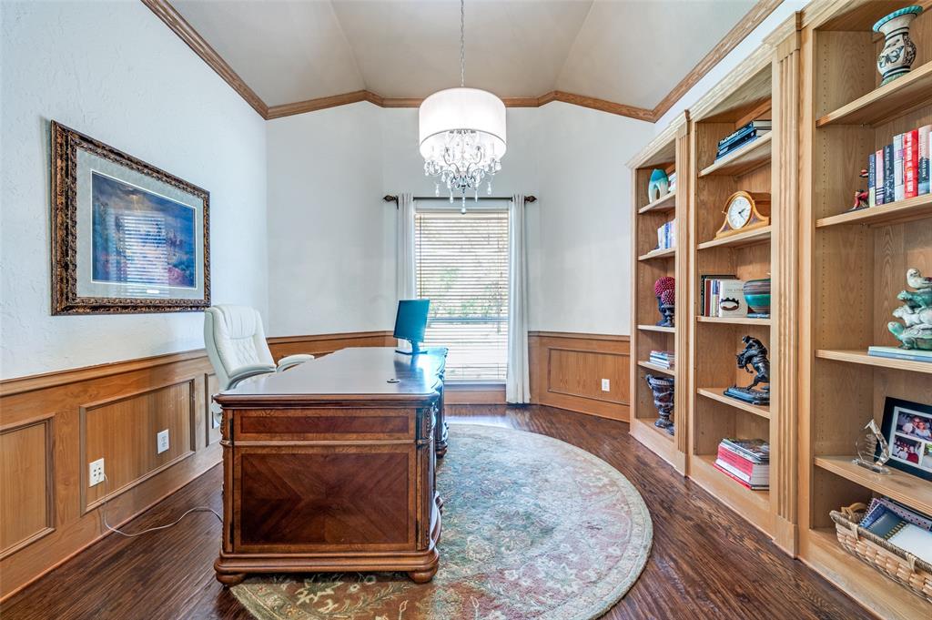2841 Winding Creek Road Prosper, TX 75078 - Photo 13 of 40 a room with furniture and a book shelf