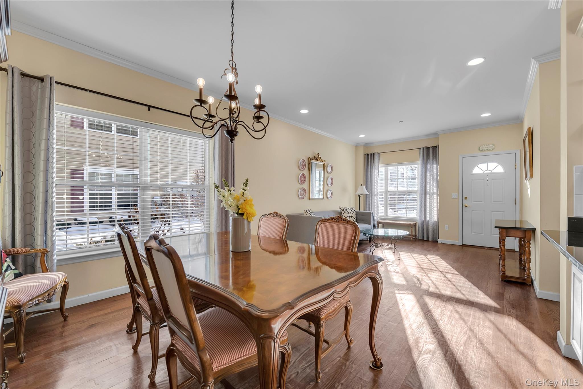286 Spring Drive, Unit 286 East Meadow, NY 11554 - Photo 5 of 27 a view of a dining room with furniture window and outside view