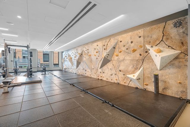 a lobby with glass door and glass windows