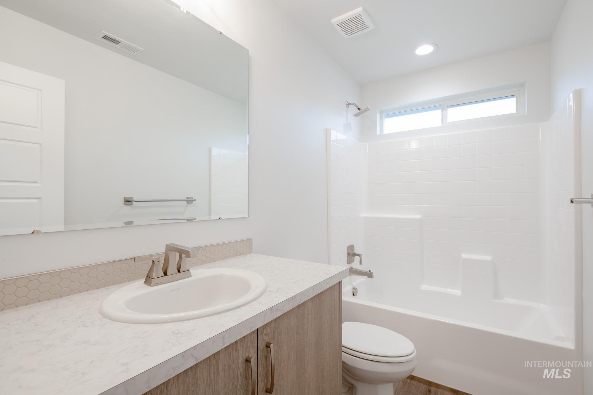 3281 North Waterbrook Way Star, ID 83669 - Photo 15 of 21 Full bathroom with shower / bathtub combination and vanity