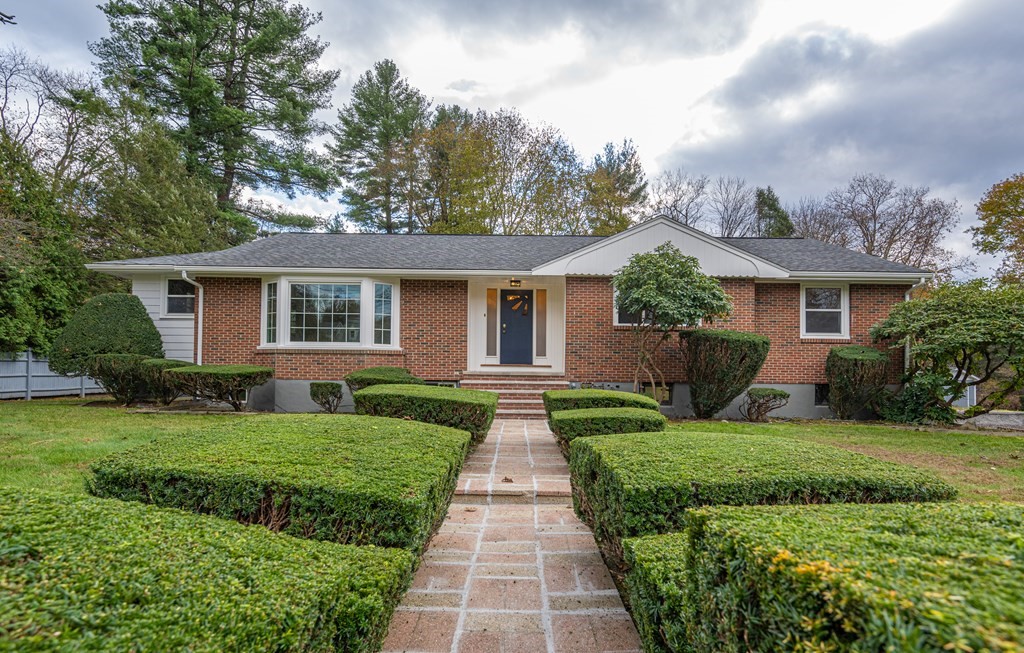 107 Boston Post Road Wayland, MA 01778 - Photo 1 of 42 a front view of a house with yard
