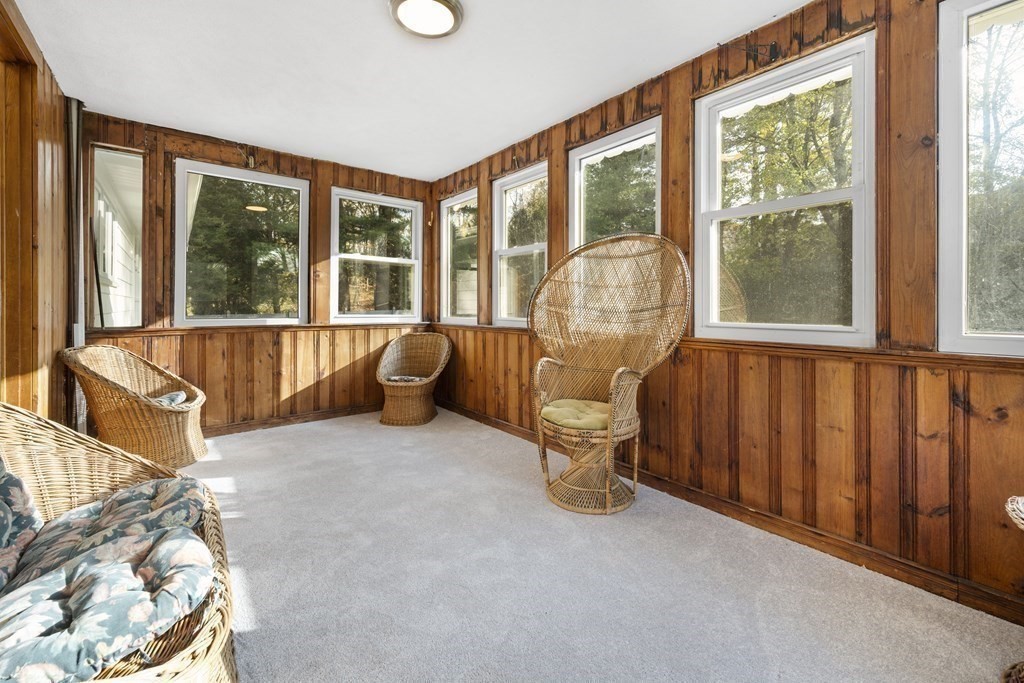107 Boston Post Road Wayland, MA 01778 - Photo 19 of 42 a living room with furniture and a large window