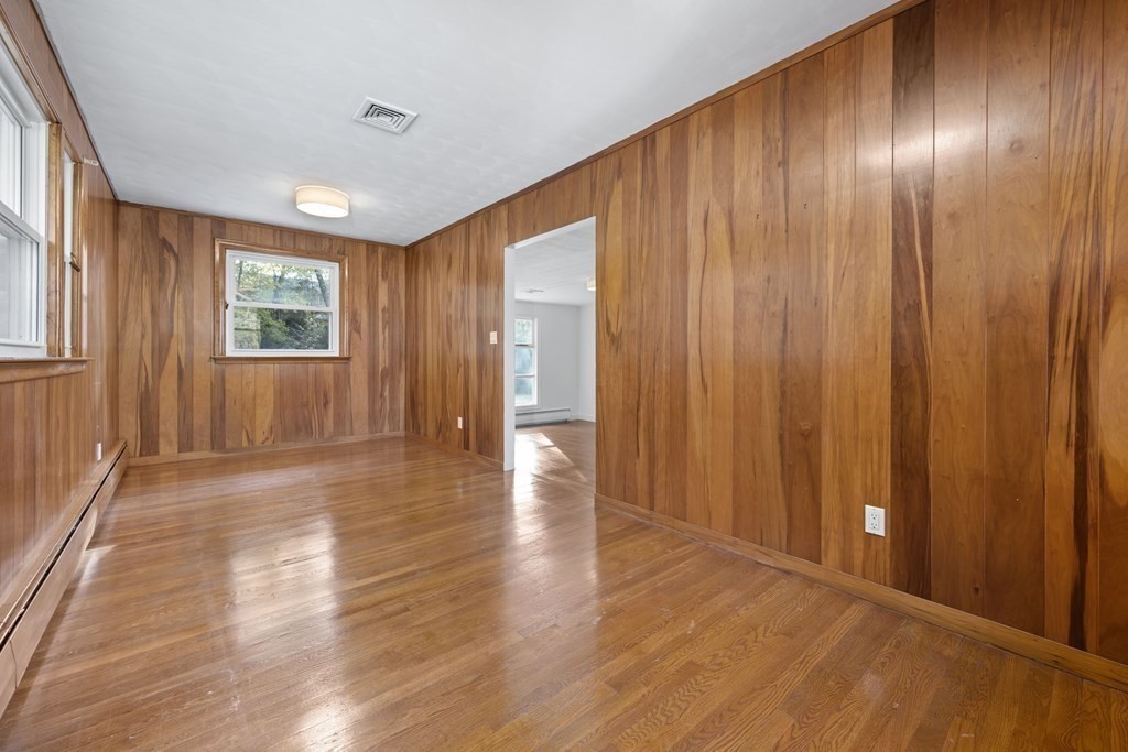 107 Boston Post Road Wayland, MA 01778 - Photo 23 of 42 a view of an empty room with wooden floor