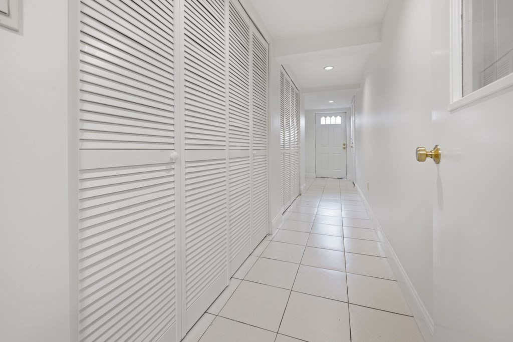 107 Boston Post Road Wayland, MA 01778 - Photo 38 of 42 a view of a hallway to rooms