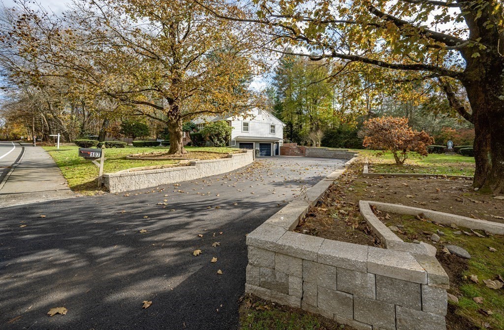 107 Boston Post Road Wayland, MA 01778 - Photo 5 of 42 a view of a yard with large trees