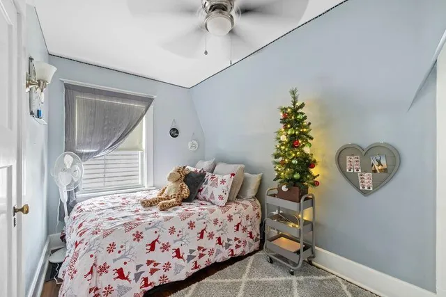 a view of walk in closet with clothes