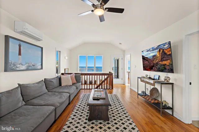 a bathroom with a bathtub and a large window