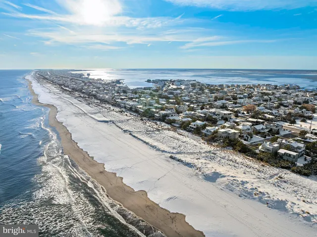 an aerial view of beach and ocean