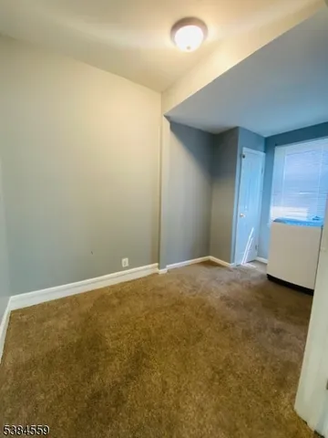 an empty room with a workbench
