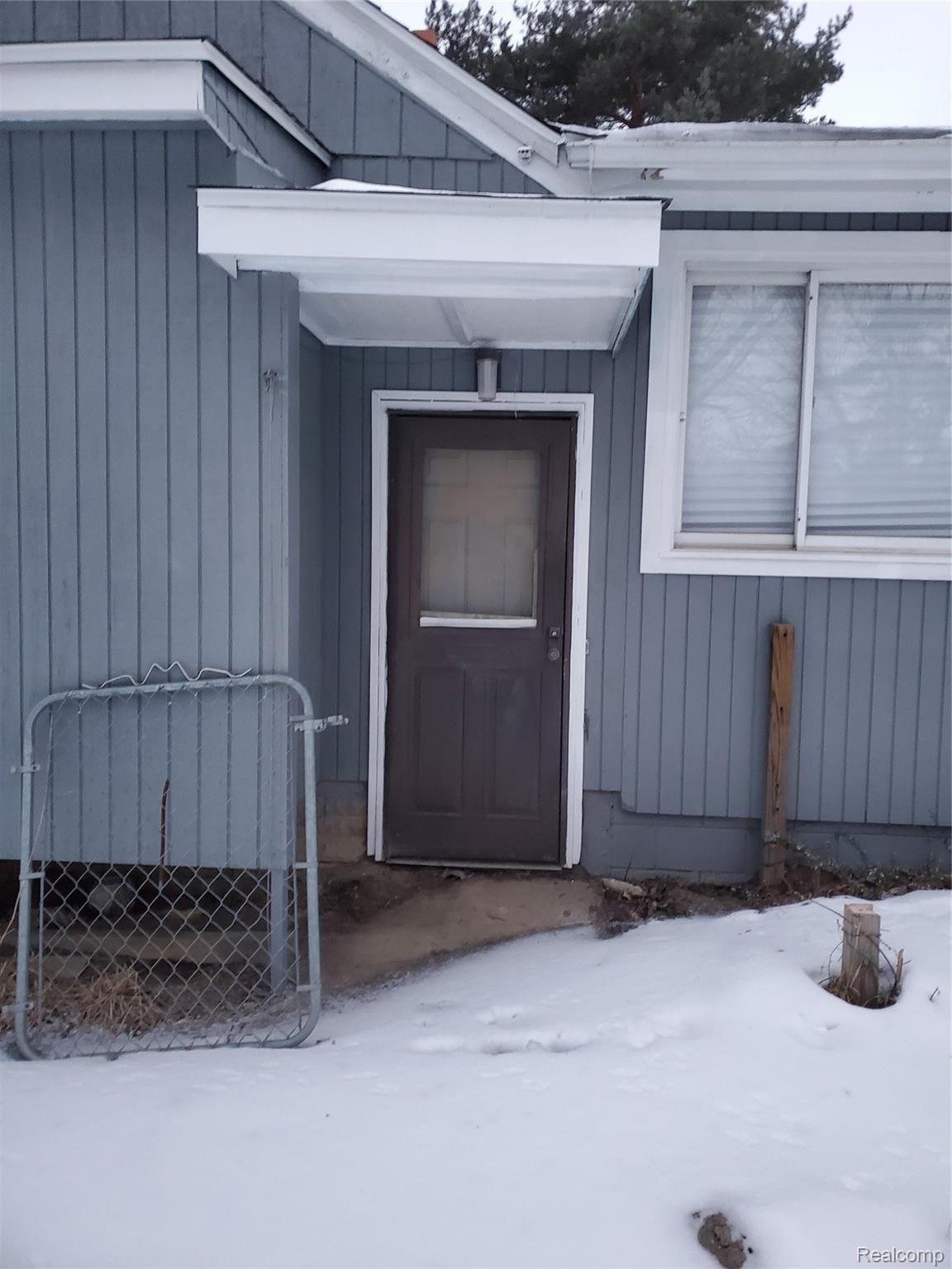 1397 South Graham Road Flint, MI 48532 - Photo 35 of 38 19) Back Door - 1397 S Graham Rd. Flint, MI