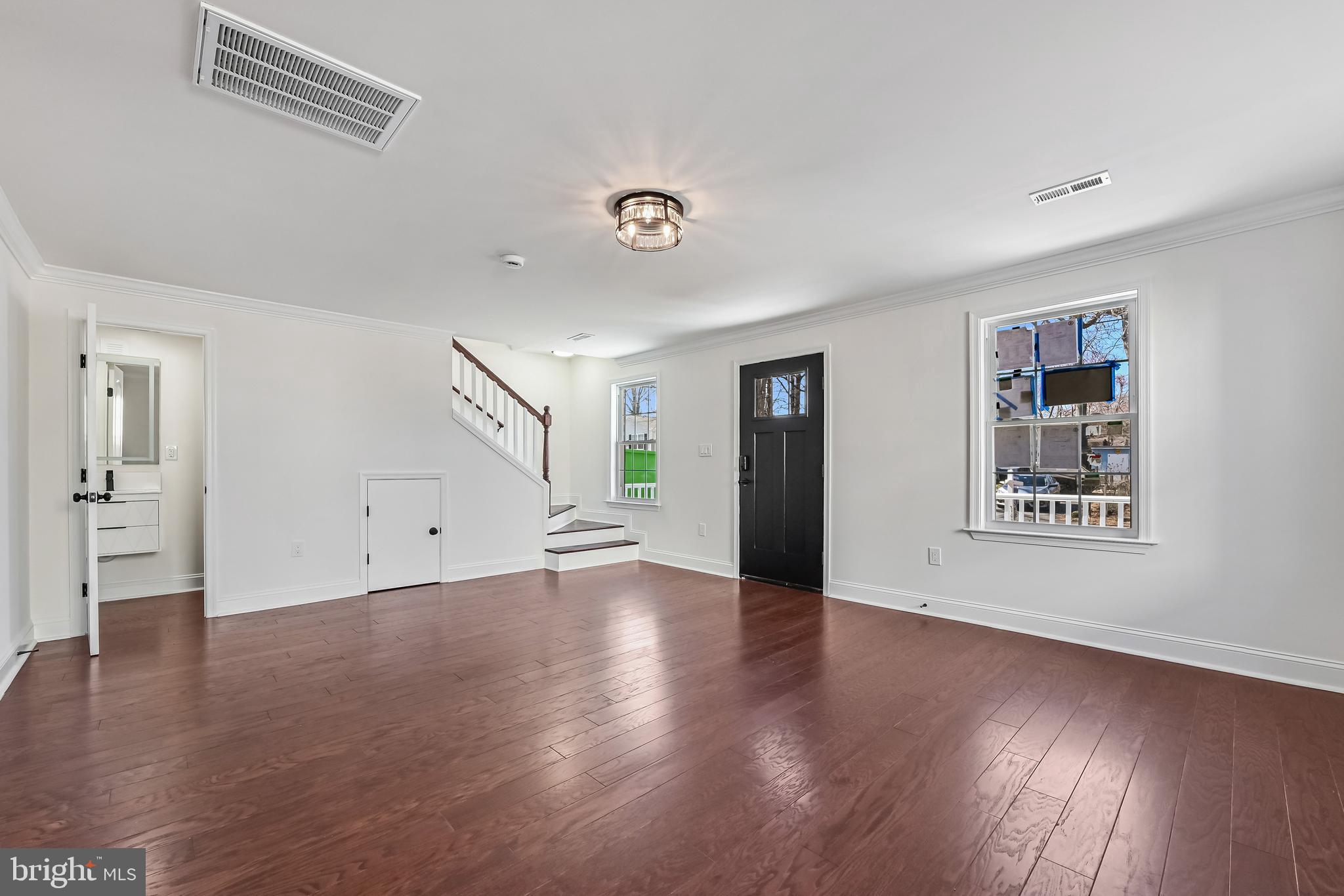 1637 Fairhill Drive Edgewater, MD 21037 - Photo 15 of 46 a view of an empty room with wooden floor