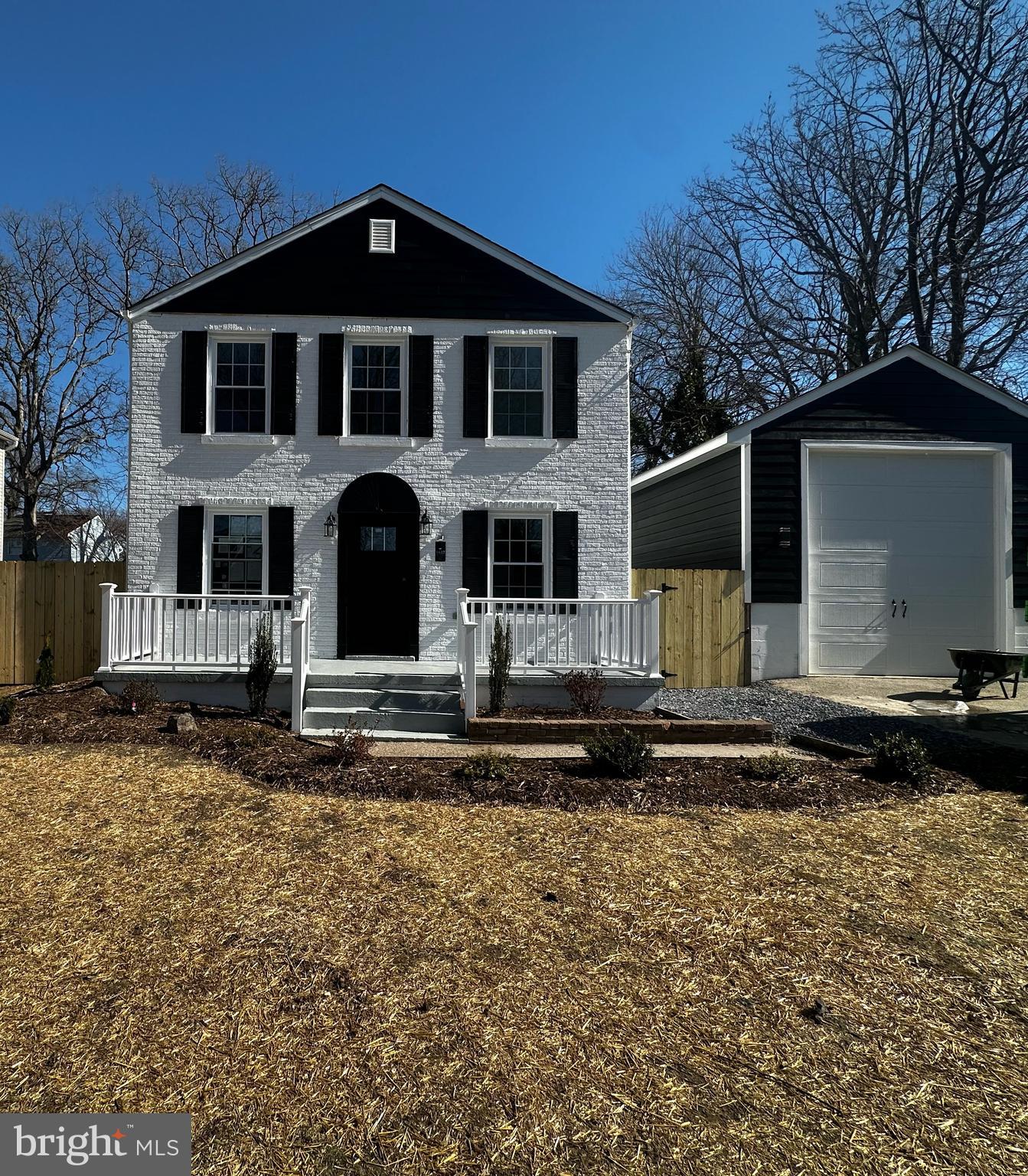 1637 Fairhill Drive Edgewater, MD 21037 - Photo 2 of 46 a front view of a house with garden