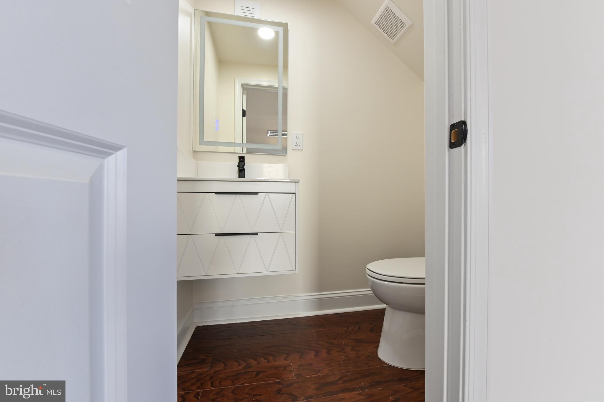 1637 Fairhill Drive Edgewater, MD 21037 - Photo 22 of 46 a bathroom with a toilet and a sink