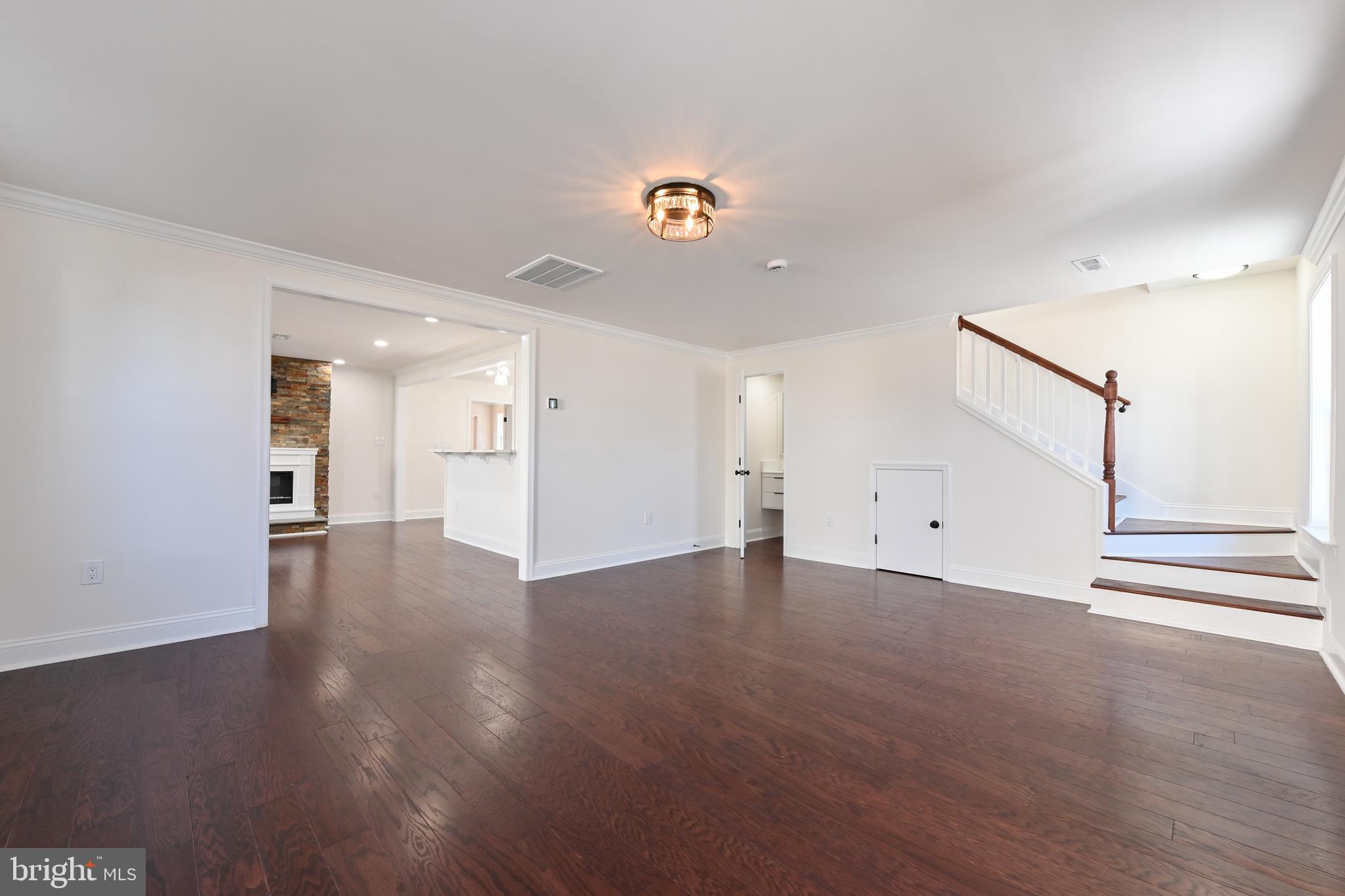 1637 Fairhill Drive Edgewater, MD 21037 - Photo 28 of 46 a view of a hallway with wooden floor