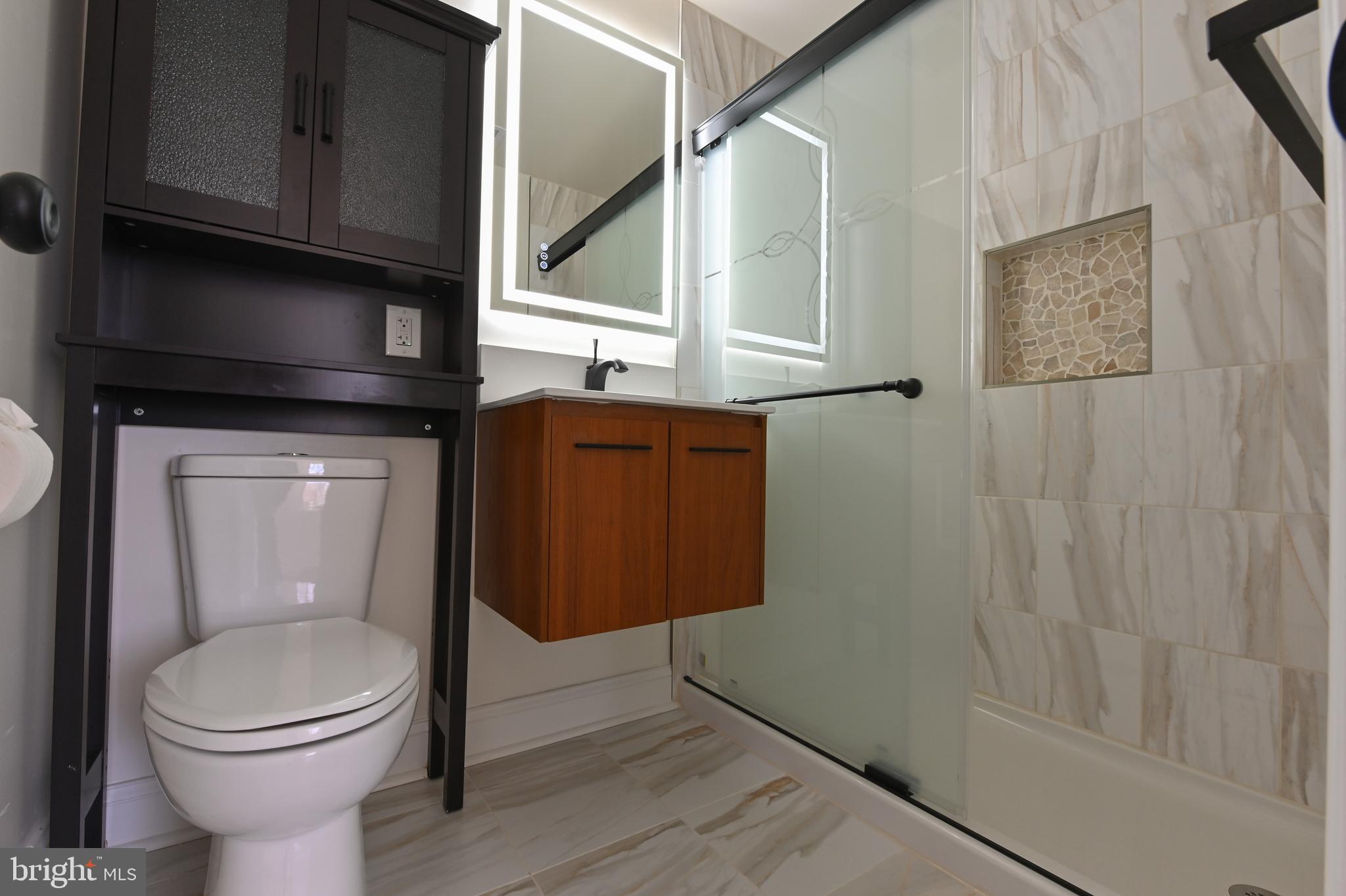 1637 Fairhill Drive Edgewater, MD 21037 - Photo 37 of 46 a bathroom with a toilet and a sink