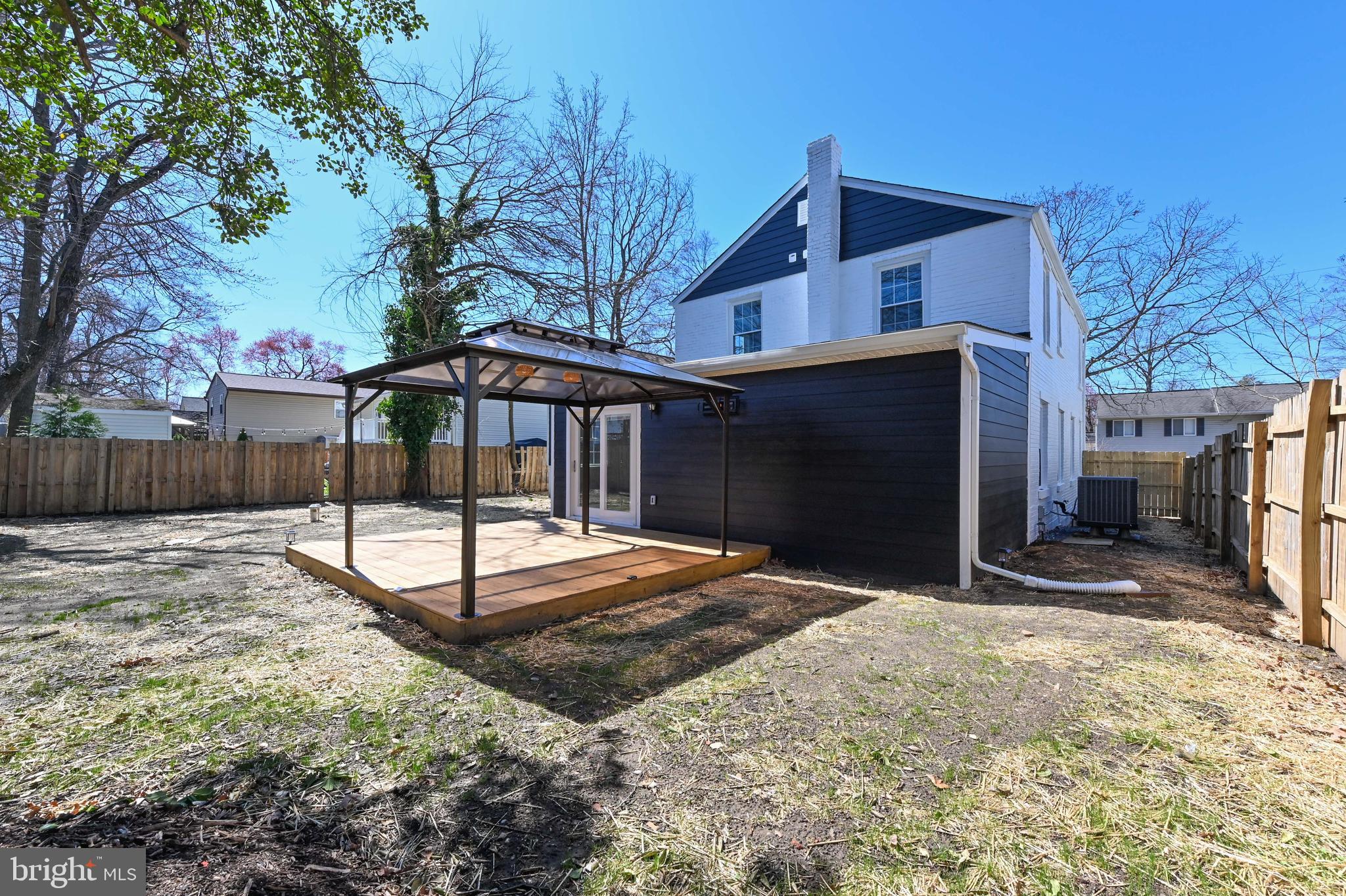 1637 Fairhill Drive Edgewater, MD 21037 - Photo 39 of 46 a view of a house with a yard and wooden fence