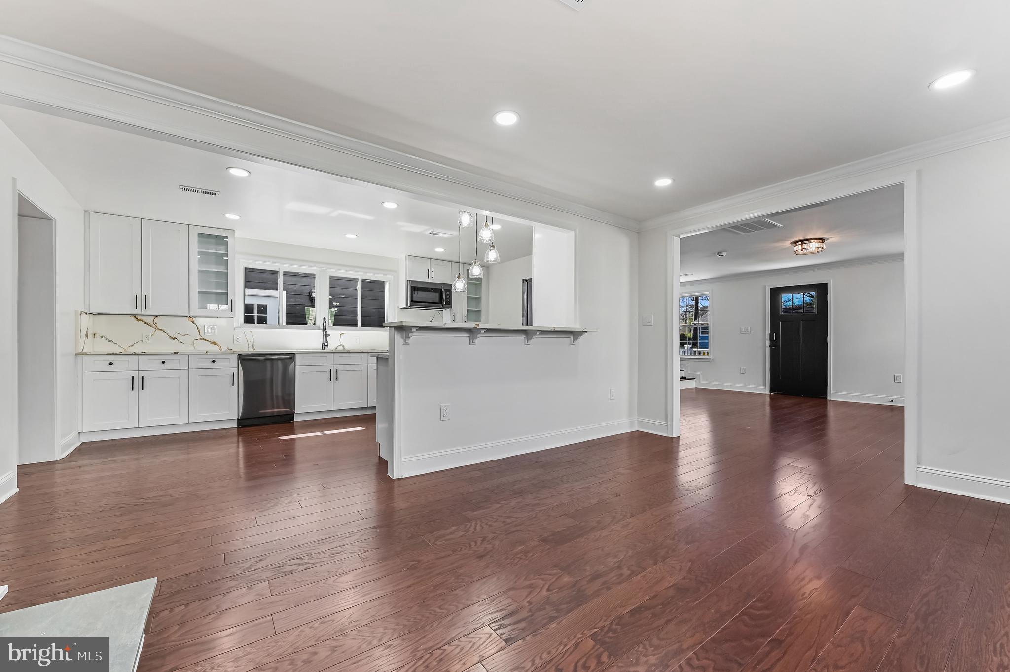 1637 Fairhill Drive Edgewater, MD 21037 - Photo 8 of 46 a view of a kitchen with stainless steel appliances granite countertop a refrigerator and a wooden floors