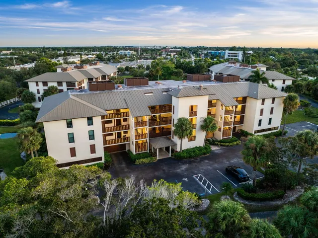an aerial view of a house with outdoor space
