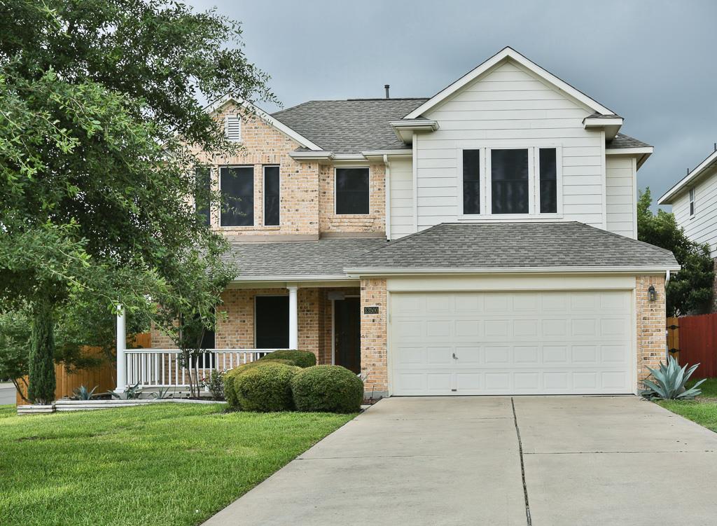 13500 Oregon Flat Trail Austin, TX 78727 - Photo 1 of 23 a front view of house with yard and green space