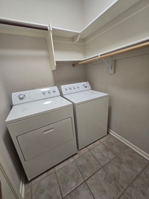 13500 Oregon Flat Trail Austin, TX 78727 - Photo 11 of 23 a utility room with dryer and washer