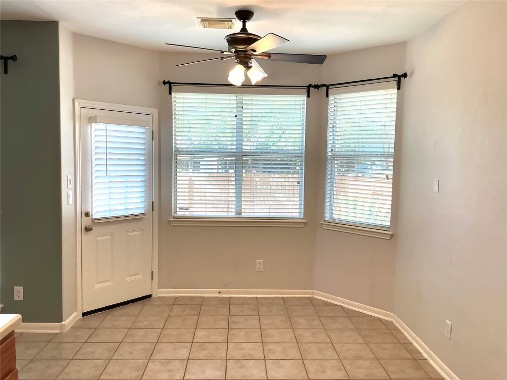 13500 Oregon Flat Trail Austin, TX 78727 - Photo 6 of 23 a view of an empty room with a window
