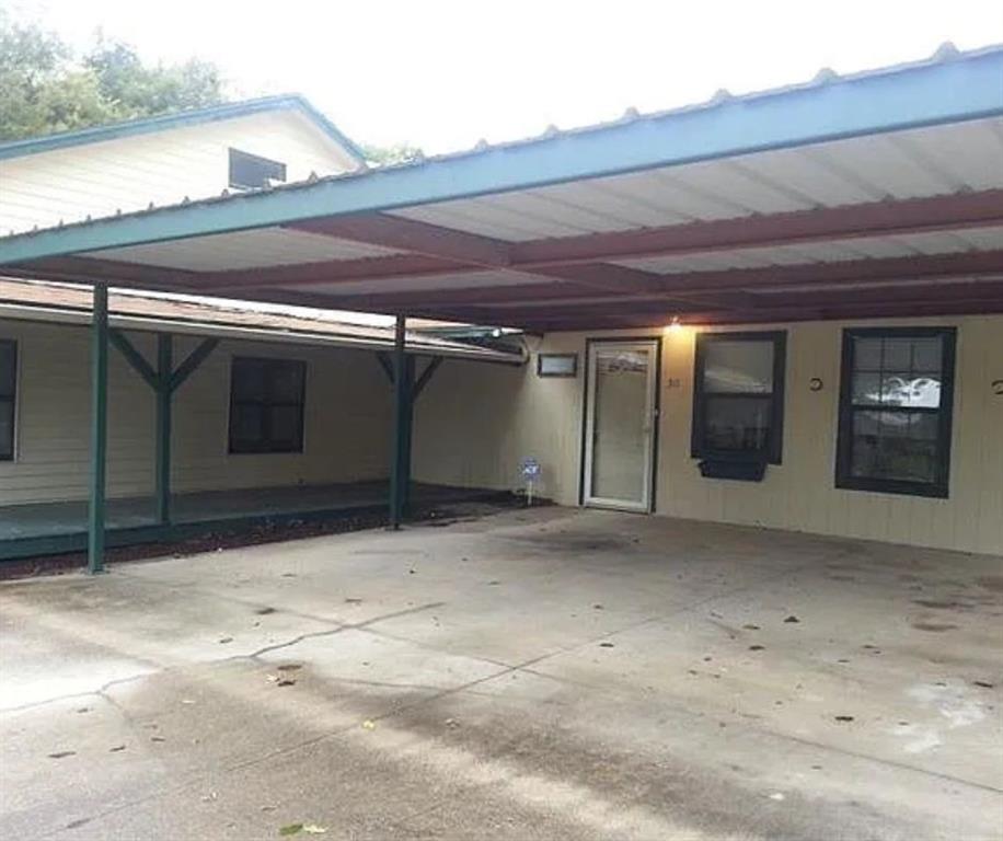 511 Rogers Road Newark, TX 76071 - Photo 18 of 22 View of patio / terrace featuring an attached carport