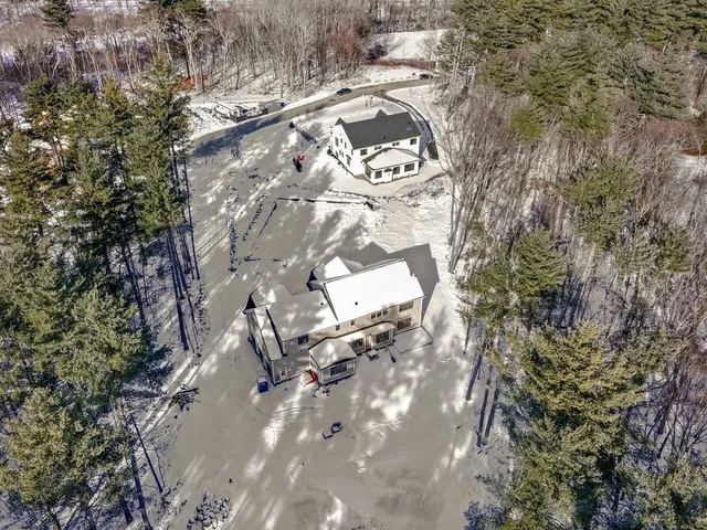 a view of staircase with lots of windows and wooden door