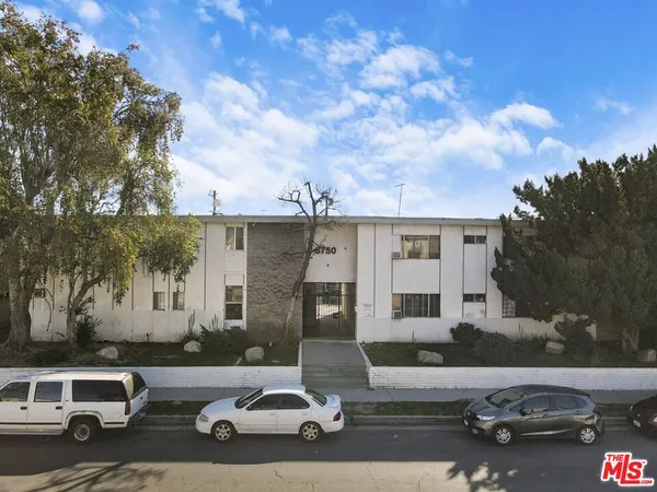 a car parked in front of a house