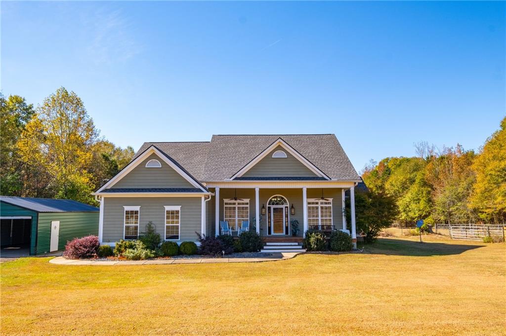 a front view of a house with a yard