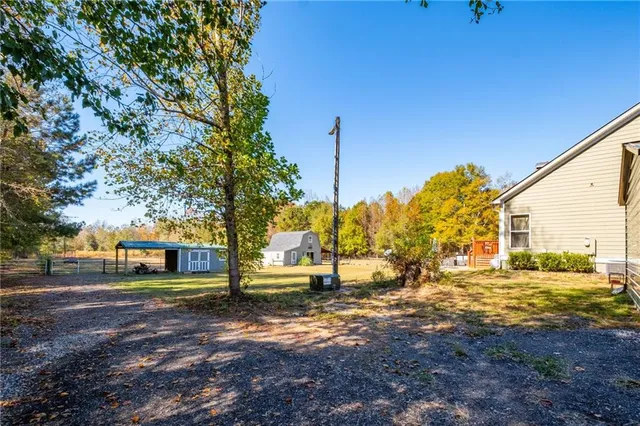 a view of yard with tree