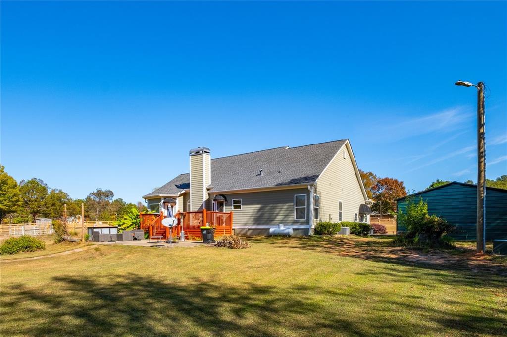 230 Mt Pleasant Road Hampton, GA 30228 - Photo 19 of 51 a view of swimming pool with outdoor seating