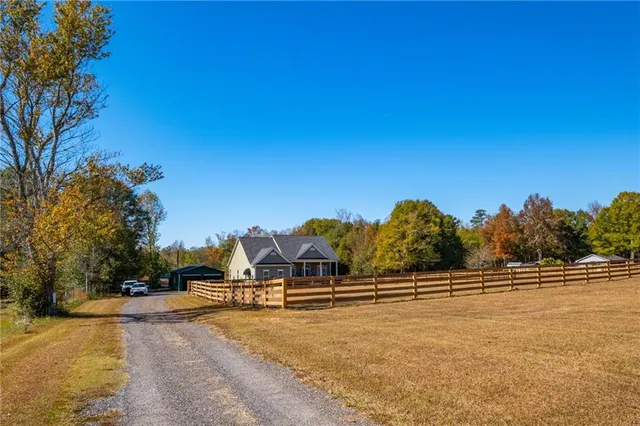 a view of swimming pool with outdoor seating
