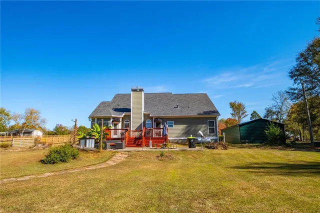 a view of a house with a swimming pool