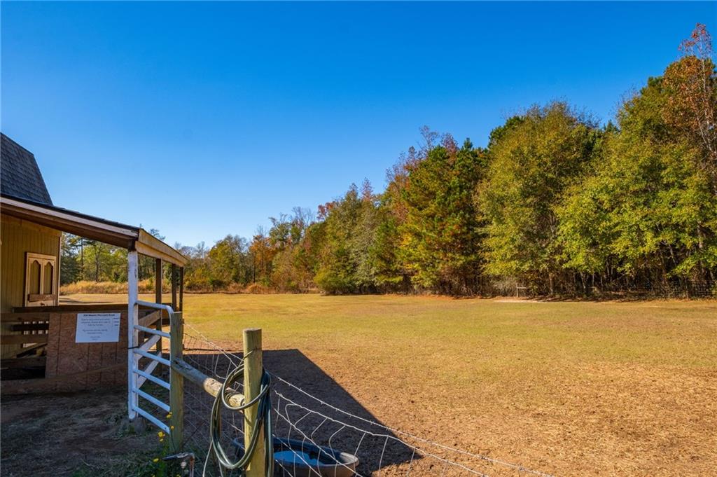 230 Mt Pleasant Road Hampton, GA 30228 - Photo 26 of 51 a view of an ocean with a building in the background