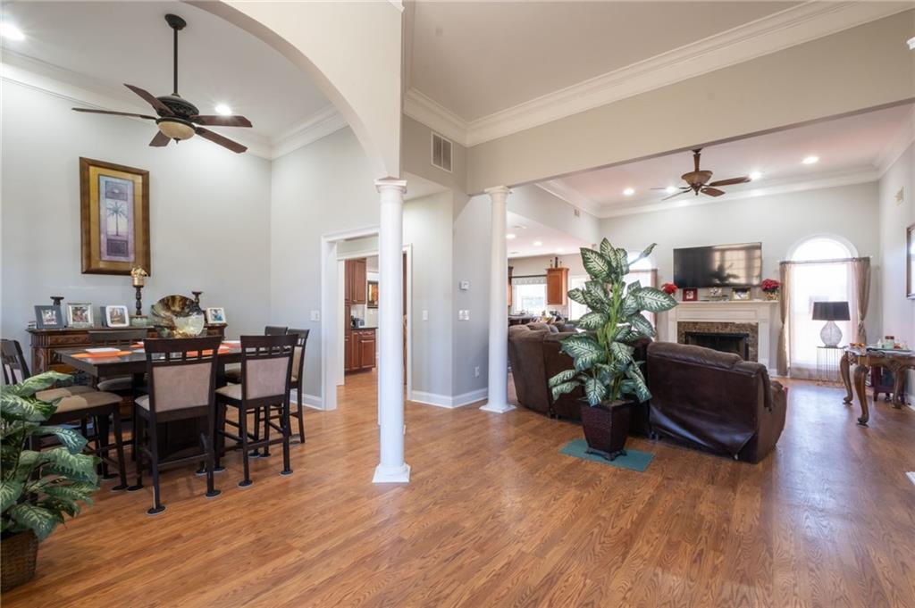 230 Mt Pleasant Road Hampton, GA 30228 - Photo 30 of 51 a view of a dining room with furniture window and wooden floor