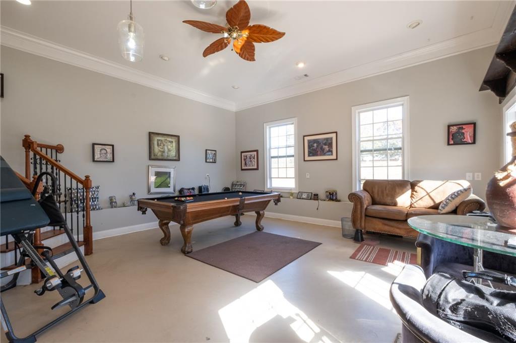 230 Mt Pleasant Road Hampton, GA 30228 - Photo 40 of 51 a living room with furniture a rug and a window