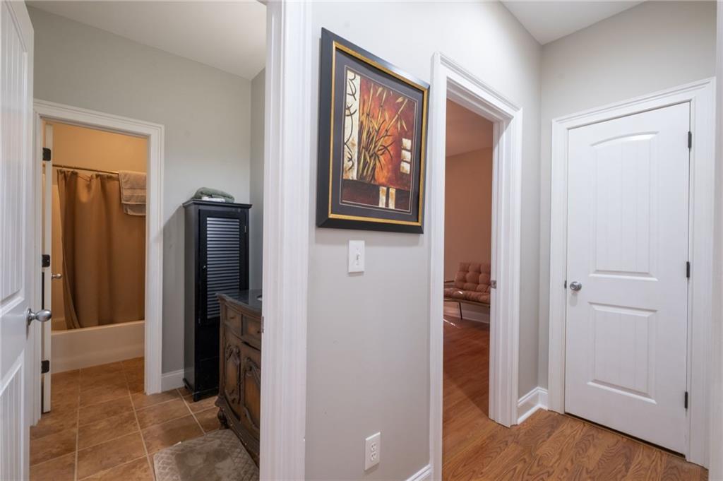 230 Mt Pleasant Road Hampton, GA 30228 - Photo 46 of 51 a view of a hallway with wooden floor and closet