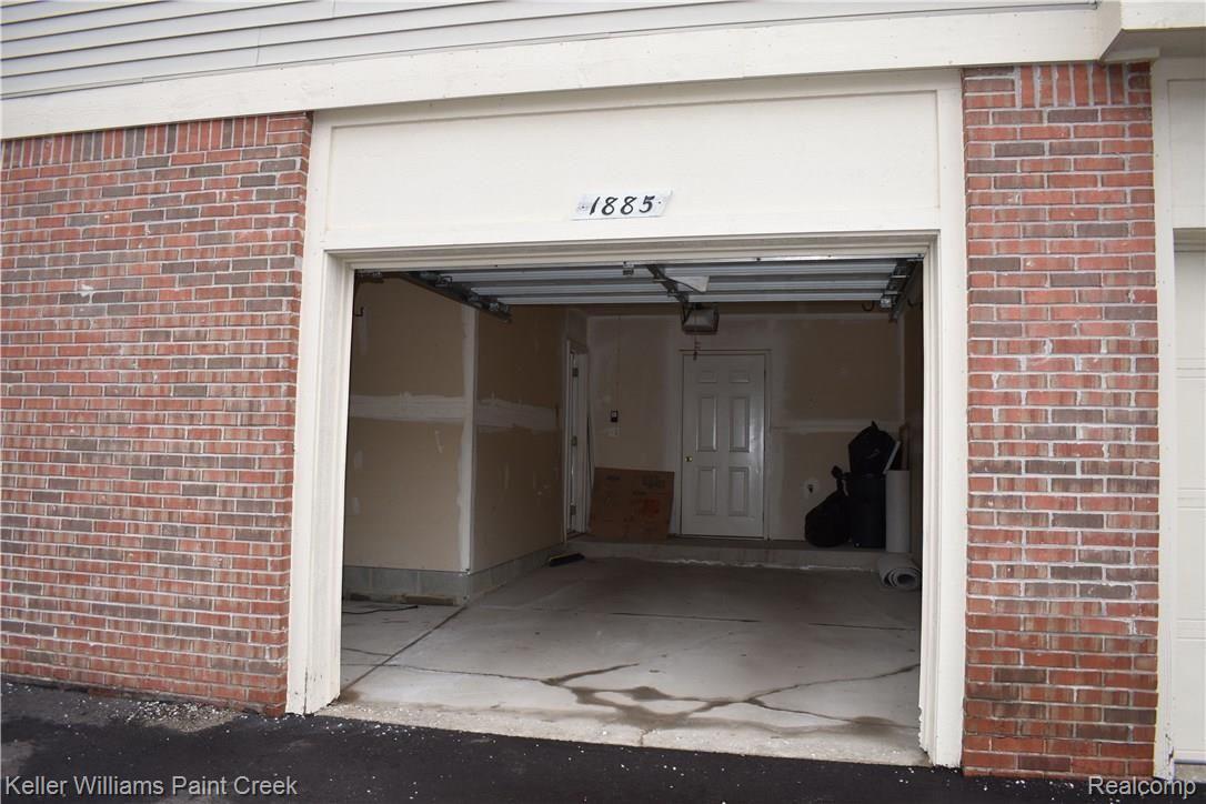 1885 Flagstone Circle Rochester, MI 48307 - Photo 4 of 32 THE DOOR TO THE LEFT LEADS TO THE 1ST FLOOR FOYER. THE CENTER DOOR LEADS TO THE UTILITY ROOM WHICH CONTAINS THE GAS FORCED AIR FURNACE & THE WATER HEATER. THE LARGE BONUS AREA TO THE LEFT (6 X 9) IS GREAT FOR ADDITIONAL STORAGE
